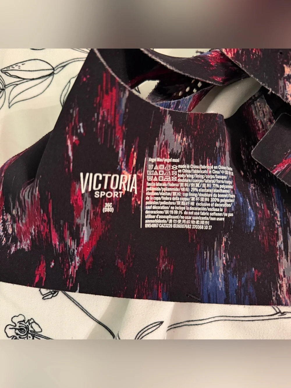 Victoria Sport Printed High-Support Sports Bra in Black with Pink & Blue Accents